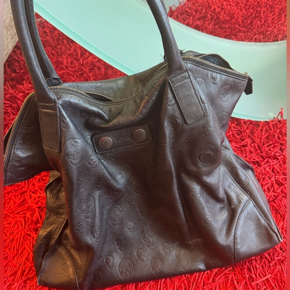 Alexander McQueen Handbags - Alexander McQueen Black Leather Tote Bag with embossed skulls and magnetic flaps
